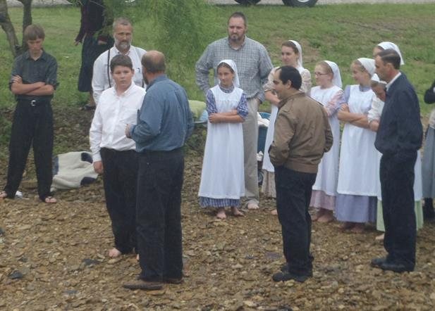Gathered at the water for the confession of faith